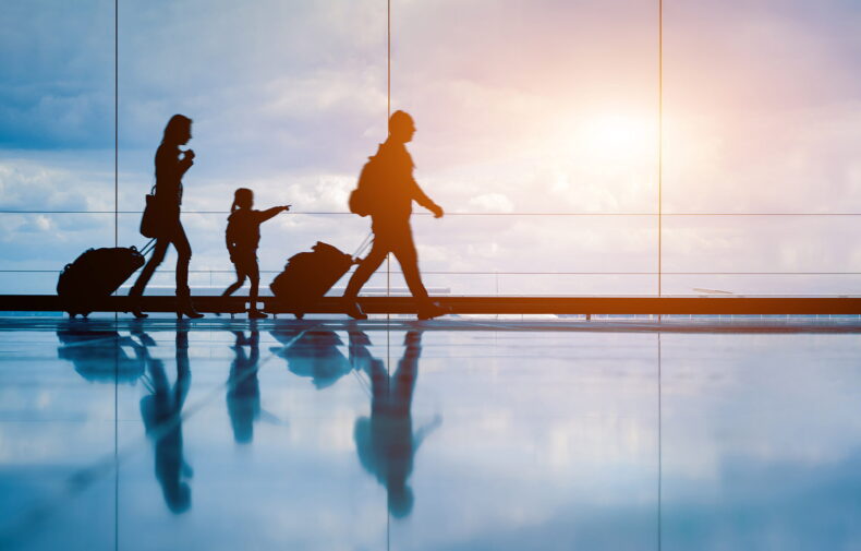 Accueil avec pancarte à l'aéroport de Genève par un chauffeur ELM Limousine